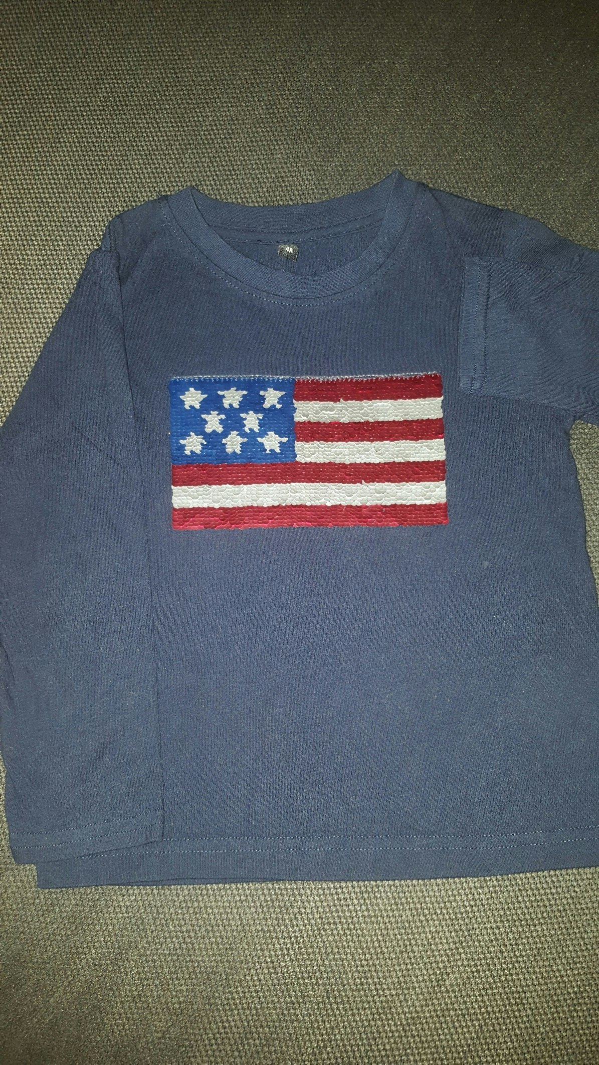 T shirt manches longues à sequin magiques.