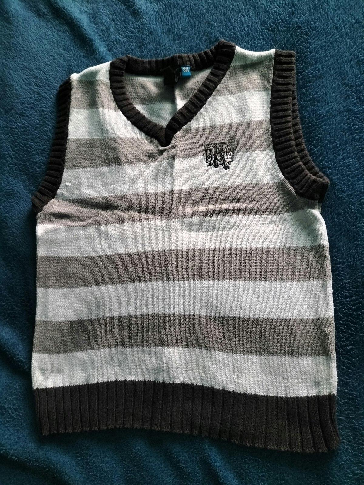 Pull sans manche 8 ans