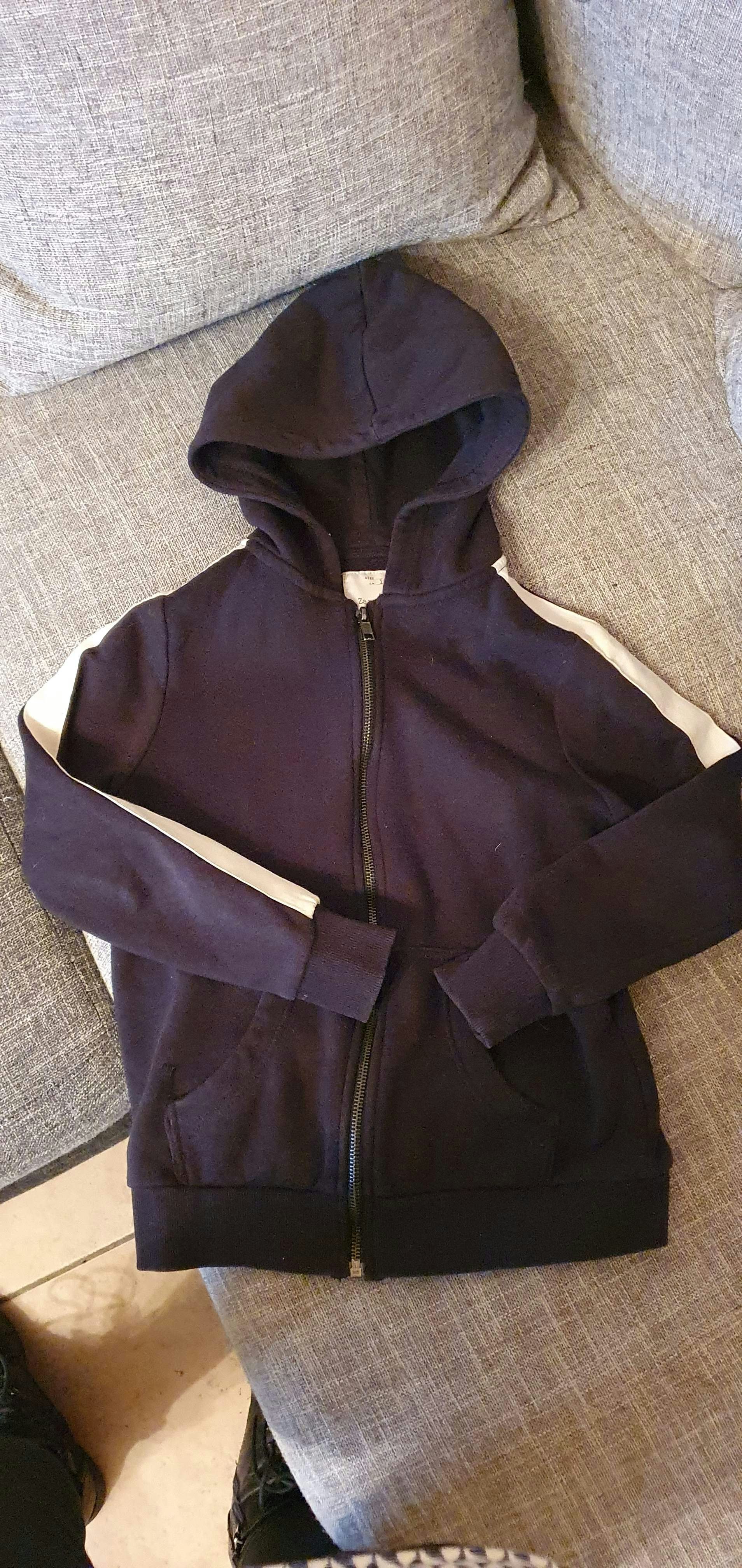 Veste noir et blanche 8 ans